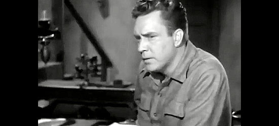 Edmund O'Brien as Ben Anthony, a man determined to sort out who's behind the trouble in Cow Country (1953)