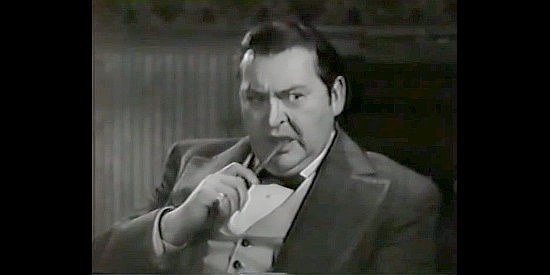 Edward Arnold as James Cork, irritated that a key parcel of property wound up in the wrong hands in The Lady from Cheyenne (1941)