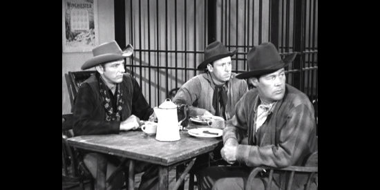 Gang members (from left) Jonas Bailey (Denver Pyle), Will Peters (Dick Crockett) and Marv Ronsom (John James), inpatient to cash in in Topeka (1953)