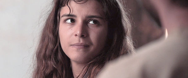 Isabella Walker as Clarissa Hawkins, growing closer to Alonzo Murrieta in Gunfight at Dry River (2021)