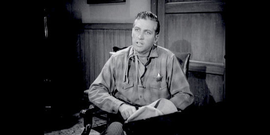 John Hart as Marshal Matt Furness, trying to secure a pardon on Joe Daniels' behalf in Kansas Territory (1952)