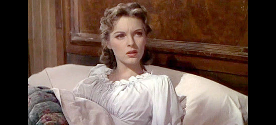 Julie London as Janie Martin, her sleep interrupted by a wounded Logan Barrett (Gordon MacRae) in Return of the Frontiersman (1950)