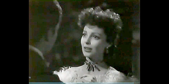 Loretta Young as Annie Morgan, reminding a lovestruck Steve Lewis who he works for in The Lady from Cheyenne (1941)