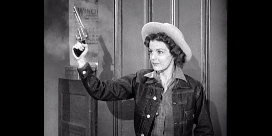Marjorie Lord as Jane Dudley, coming to Frank Graham's defense in Rebel City (1953)