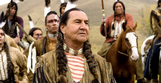 August Schellenberg as Sitting Bull, arriving for a conference with Col. Nelson Miles in Bury My Heart at Wounded Knee (2001)