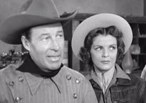 Bill Elliott as Frank Graham with Marjorie Lord as Jane Dudley in Rebel City (1953)