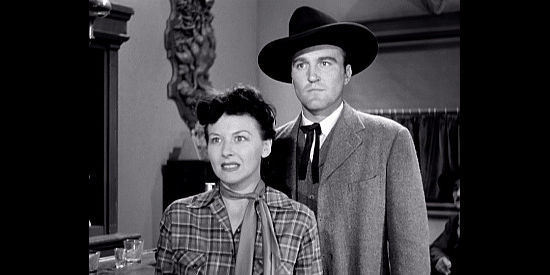 Pamela Blake as Kathy Clark with her foreman Wallace (Lane Bradford), confronting Matt Boone in Waco (1952)