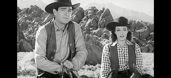 Rod Cameron as John Sands, being shown the valley his brother loved so much by 'Dusty' Stewart in Panhandle (1948)
