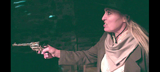 Sandy Penny as Victoria Bonham, taking matters into her own gun hand in Badland Doves (2021)