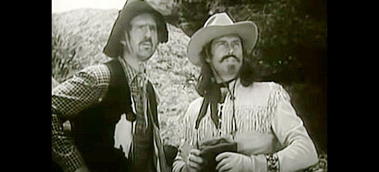 Slim Andrews as Cactus and Clayton Moore as Buffalo Bill, hoping to be welcomed into the Sioux camp in Buffalo Bill in Tomahawk Territory (1952)