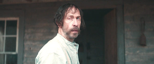 Tim Blake Nelson, in his first encounter with Ketchum in Old Henry (2021)