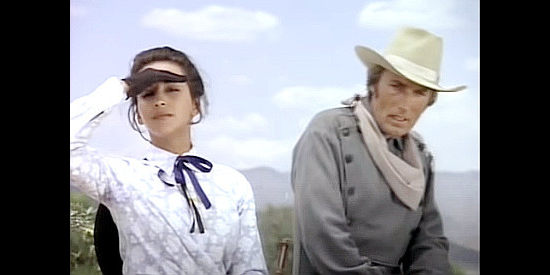 Adriana Parra as Pilar Romero with Madison Mason as Jonathan Quell in Showdown at Eagle Gap (1982)