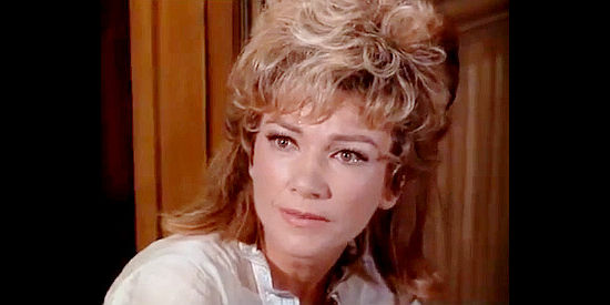 Anne Baxter as Valverde Johnson, a widow fearing her son will become a railroad deputy in Stranger on the Run (1967)