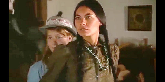 Celia Xavier as Inez, the Navajo girl trying to protect Mary Bolton (Jennifer Snyder) from harm in The Tracker (1988)