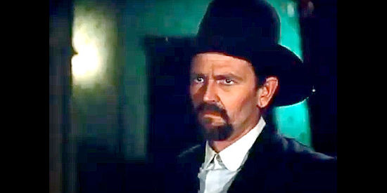 Charles Benton as Ike Clanton, defying Wyatt's no-firearms rule in I Married Wyatt Earp (1983)