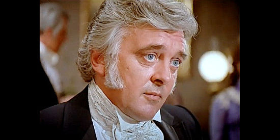 David Henmings as Capt. James O'Neill, the Englishman who adopts Calamity's daughter in Calamity Jane (1984)