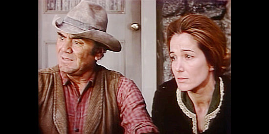 Ernest Borgnine as Sam Paxton and Julie Adams as wife Dora, worried about their daughter in The Trackers (1971)