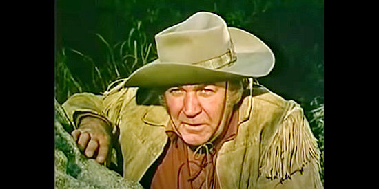 Forrest Tucker as wagonmaster Callahan, scouting an Indian camp in The Wackiest Wagon Train in the West (1976)