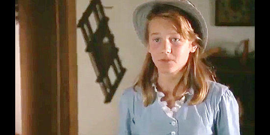 Jennifer Snyder as Mary Bolton, interrupting outlaws ramsacking her father's home in The Tracker (1988)