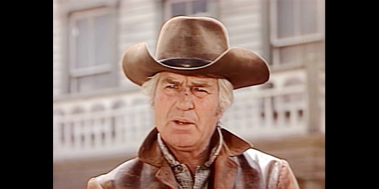 Jim Davis as Sheriff Tom Naylor, the bigoted lawman who helps Paxton search for his daughter in The Trackers (1971)