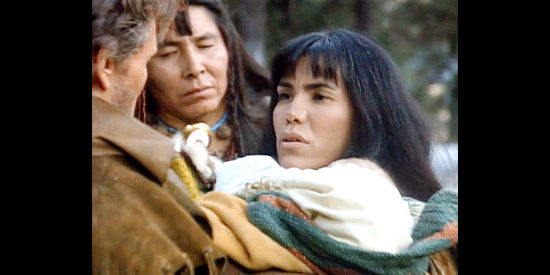 Joanelle Romero as Little Deer, Many Horses' wife, taking possession of Jericho's baby in Miracle in the Wilderness (1991)