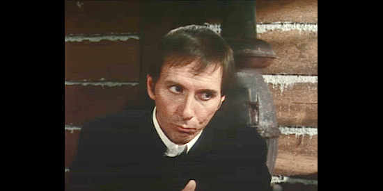 John Hart as The Rev. Thorndike, trying to convince his parishioners to do a good deed for the holidays in Christmas Mountain (1981)
