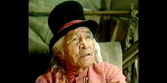Johnny Looking Cloud as Chief Running Wolf, grandfather of Josiah and a chief among the Shoshone in The Avenging (1982)