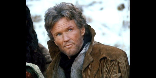 Kris Kristofferson as Jericho Adams, learning why his home was raided in Miracle in the Wilderness (1991)