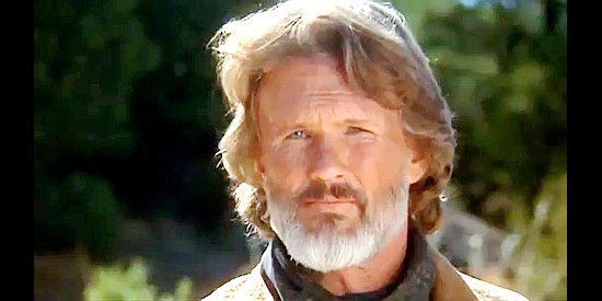 Kris Kristofferson as Noble Adams, wondering if his son can kill the way he'll have to when facing vicious outlaws in The Tracker (1988)