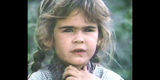 Lisa MacFarlane as Betty Sue Powell, a 5-year-old orphaned in an attack on the wagon train in Down the Long Hills (1986)
