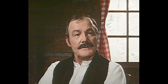 Logan Field as Doc Thatcher, the man who says he's too busy to look in on a pregnant Mexican woman in Christmas Mountain (1981)