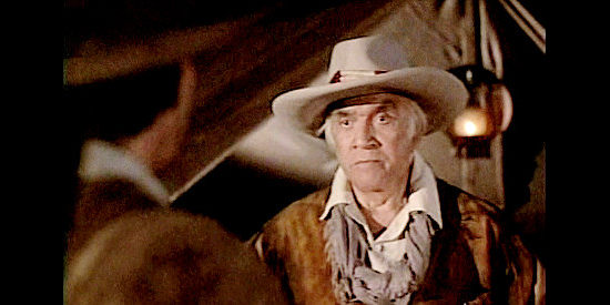 Lorne Greene as Gen. Sam Houston, listening to a plea for help from Maj. Bonham in The Alamo, Thirteen Days to Glory (1987)