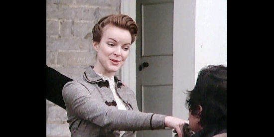 Marcia Cross as Sarah Hite, meeting the James brothers for the first time in The Last Days of Frank and Jesse James (1986)