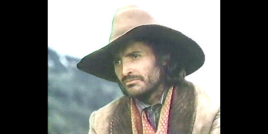 Michael Wren as Cal, one of the horse thieves who starts all the trouble in Down the Long Hills (1986)