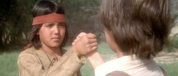 Patrick Montoya as a young Tonto becoming blood brothers with a young John Reid in The Legend of the Lone Ranger (1981)