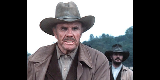 R.G. Armstrong as Sheriff Miles Gillette, determined to return Black Jack Travern to jail in The Shadow Riders (1982)