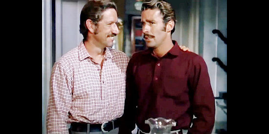 Richard Boone as John W. Gamble and Peter Lawford as Richard Connor, partners in a scheme to lay claim to Michael McGuire's ranch in Kangaroo (1952)