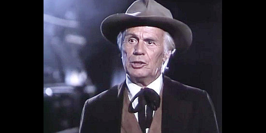 Richard Widmark as Capt. Oren Hayes, confronting Maggie about her feelings for John Henry in Once Upon a Texas Train (1988)