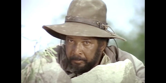 Rockne Tarkington as Enterprise Jackson, watching Kirk's men corner a lone Apache in Showdown at Eagle Gap (1982)