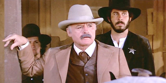 Rod Steiger as Bill Tilghman, the lawman on the trail of the Doolin-Dalton gang in Cattle Annie and Little Britches (1981)