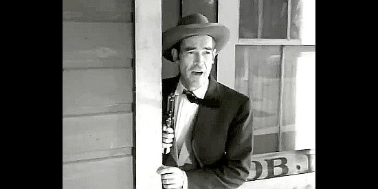 Rory Mallinson as Ed Larkin, ready for a showdown with the Dentons in Three Desperate Men (1951)