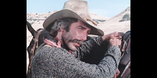 Sam Elliott as Dal Traven, a former Confederate who returns home to a new mission in The Shadow Riders (1982)