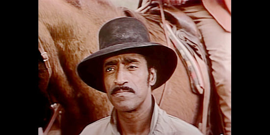 Sammy Davis Jr. as Ezekiel Smith, the black tracker who shows up to help Sam Paxton finds his daughter in The Trackers (1971)