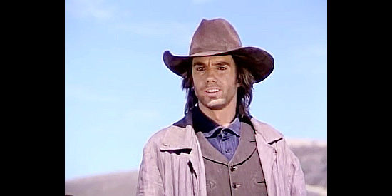 Shaun Cassidy as Cotton, planning to rob the thieves in Once Upon a Texas Train (1988)