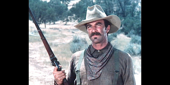 Tom Selleck as Mac Travern, standing up for a family member in The Shadow Riders (1982)