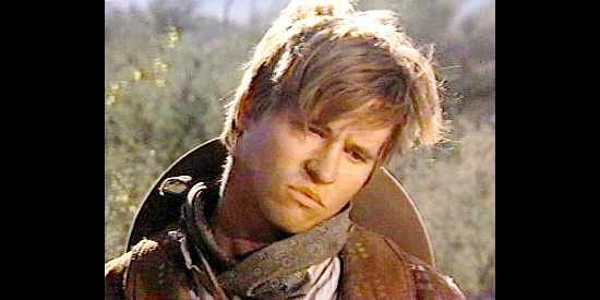Val Kilmer as Billy the Kid, mourning the death of John Tunstall in Billy the Kid (1989.