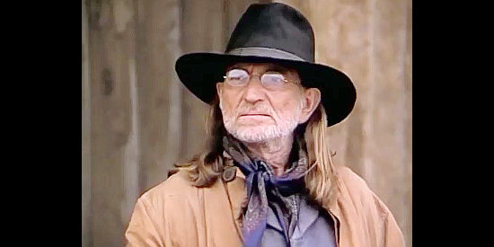 Willie Nelson as John Henry Lee, walking out of prison after 20 years in Once Upon a Texas Train (1988)