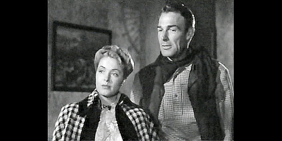 Ann Richards as newspaper editor Henryetta Alcott with Sheriff Mark Rowley (Randolph Scott) in Badman's Territory (1946)