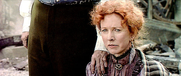 Barbara Babcock as Nora Christie, distraught over the loss of her home and daughter in Far and Away (1992)