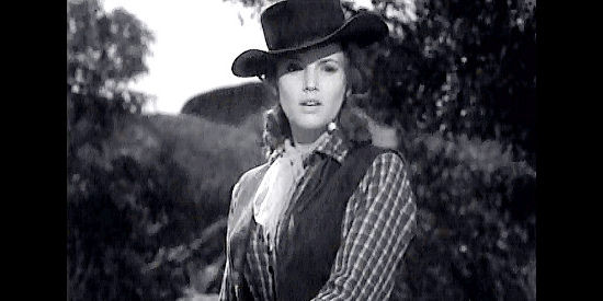 Barbara Britton as Cherry Lucas, watching her husband try to capture a vicious bull in The Untamed Breed (1948)